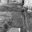 Falkland Palace Excavations
Frame 8 - Arrangement of drains in south-east corner of courtyard - from west