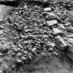 Excavation photograph : F8047/1013 - stone rings between A and B.