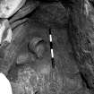 Excavation photograph : close up of food vessel in cist A.