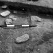 Excavation photograph : trench 1, House RA paving.