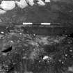 Excavation photograph : trench IIIa - feature CAA, half section, cutting 2.