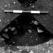 Excavation photograph : trench IV - feature DAD, pit with packing.