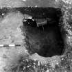 Excavation photograph : trench IV - features DAH, eastern-most ring-ditch, and DAP, pit/posthole on edge of it, sec. in cut 5.