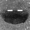 Excavation photograph : trench II - f527, half section, from above.