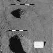 Excavation photograph : trench II - postholes BAM, BAN, BAO fuly excavated, facing north.