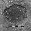 Excavation photograph : trench II - posthole BAZ, 7cm off, facing south.