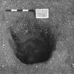 Excavation photograph : trench II - posthole BBN, excavated, facing east.