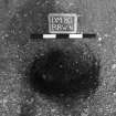 Excavation photograph : trench II - posthole BBW, excavated, from above, facing N.