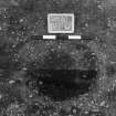 Excavation photograph : trench II - posthole BCC, half section, facing west.