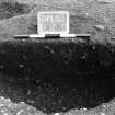 Excavation photograph : trench II - fBCW, half section, facing east.