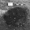 Excavation photograph : trench II -posthole BDD, pre ex, facing east.