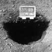 Excavation photograph : trench II - posthole BEM, half section, facing north-west.