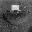 Excavation photograph : trench II - posthole BFB, half section, facing north.