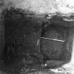 Excavation photograph : clay lining of pit f166, from W.