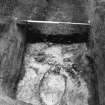 Excavation photograph : close up of pit f166, from W.