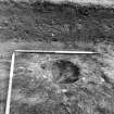 Excavation photograph : posthole f322 after excavation, from S.