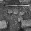 Excavation photograph : masonry f514 within pit f513, below wall f139, from N.