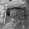 Excavation photograph : pit f528 partially excavated, from W.