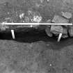 Excavation photograph : sections across pits f360 and f516, from N.