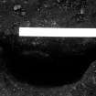 Excavation photograph : section across pit f632, from N.