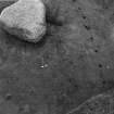 Excavation photograph.  Stone 7 and F122 stakeholes.