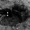 Excavation photograph.  F116 as found, previously largely excavated, from south.