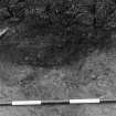 Excavation photograph. Feature in south section, from north.