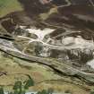 Close up aerial view of quarry in Strathrory, N of Alness, Easter Ross, looking NNE.