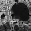 Excavation archive: Window embrasure at N end of E wall of hall, and niche at E end of N wall. From SW.