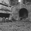 Excavation archive: SE corner of first floor hall prior to excavation. From NW.