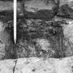 Excavation photograph : sondage through foundation cut (F10) of north curtain wall.