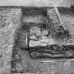 Excavation photograph : trench S, corner of building and drain, from W.
(B&W negatives colour printed)