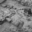 Excavation photograph : centre of trench A, from NW.
(B&W negatives colour printed)