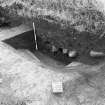Excavation photograph : area A - f242, ditch from NW showing palisade cut.