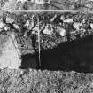 Roberton, motte: excavation photograph of ditch (S side of storm drain) from W
C Tabraham, 1979