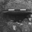 Excavation photograph : area 3 - f3061, intrusive feature half sectioned, vertical, from S.