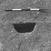 Excavation photograph : area 3 - f3067, half section intrusive feature, from N.