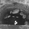 Excavation photograph : area 3 - f3155, kubiena cans in burnt deposit within stone lined pit.