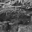 Excavation photograph : area F - completely excavated with 59 rubble to E.