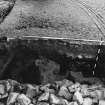 Excavation photograph showing area D at Edinburgh Castle with possible robbing cut through bedrock.