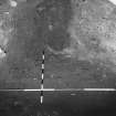 Excavation photograph : area G - half sectioned ditch? with thin mortar spread 129 on E side.