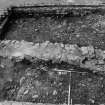 Excavation photograph : area N - view of wall 908 with detail of wall disturbance 918 to E, wall construction trench on S side.