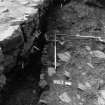 Excavation photograph : area N - general view of completely excavated linear cut under wall 908.