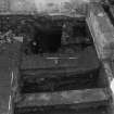 Excavation photograph : area K - E-W partition walls of detention cell exposed to foundation base.