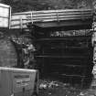 Excavation photograph : view in coalyard and through portal to shops.