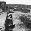 Excavation photograph : area T - general view of 19th and 17th century walls, steps and outhouses.
