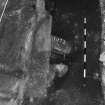 Excavation photograph: area X - NW view of flue arrangement beneath hearth.