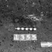 Excavation photograph: area X - patch of ash/burning, pssible soil hearth.
