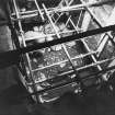 Excavation photograph: area X - general view of trench, cobbles, hearth, flagstones.