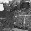 Excavation photograph: area X/H - flagstones and cobbles f1388 totally excavated, from south.